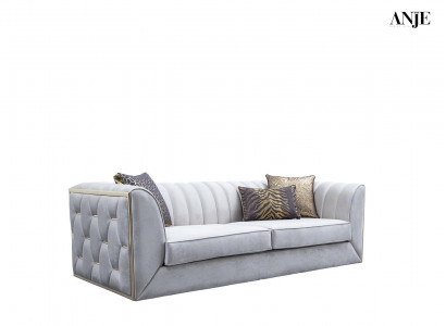 Modern three-seater sofa made of stainless steel