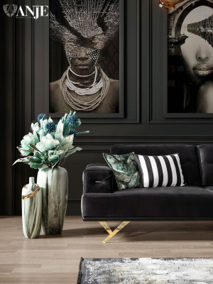 Black 3-seater sofa of modern design for the living room