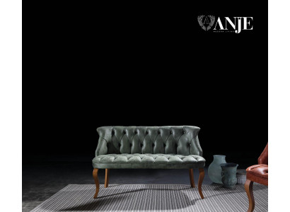 Modern two-seater sofa with artificial leather in Chesterfield style