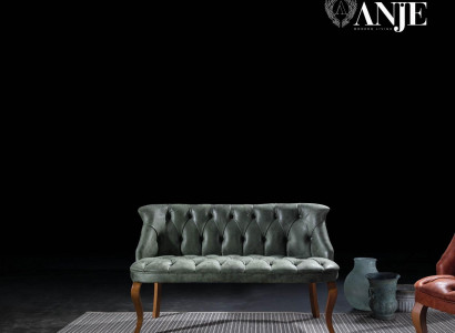 Modern two-seater sofa with artificial leather in Chesterfield style