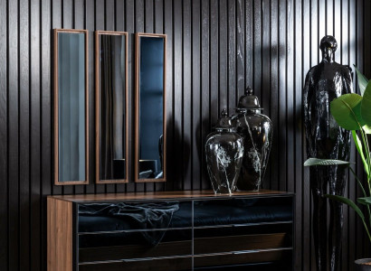 Practical black chest of drawers with 139 cm of storage space