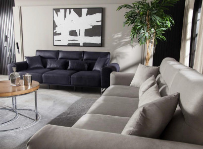 Black, soft and luxurious sofa for three people