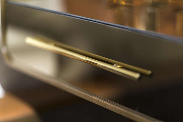 Bed with design and two glass nightstands