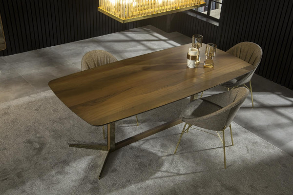 Table with gray fabric and golden legs