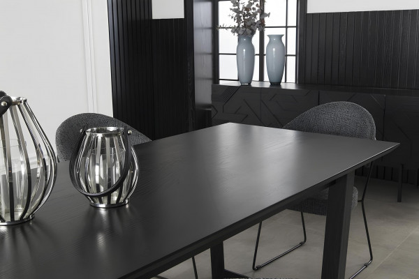 Mustan furniture set with cabinet, chairs, and table