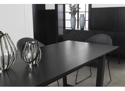 Mustan furniture set with cabinet, chairs, and table