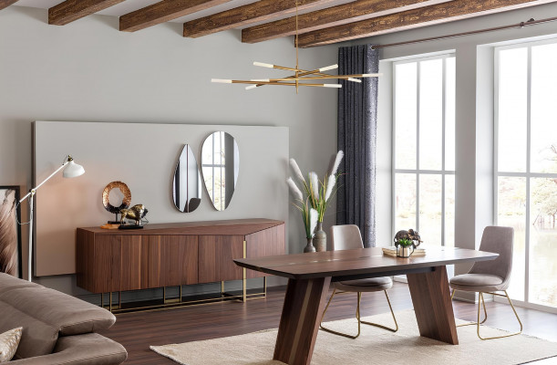 Brown dining table with 9 chairs and a nightstand