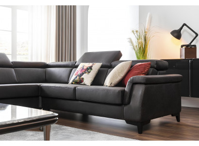 Black L-shaped sofa with bed function