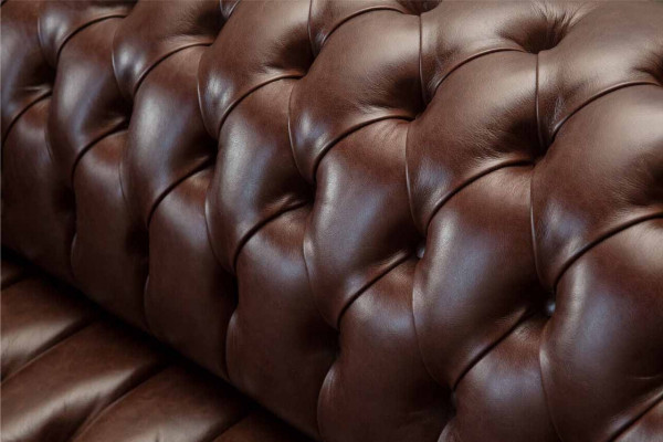 New upholstered Chesterfield two-seater sofa