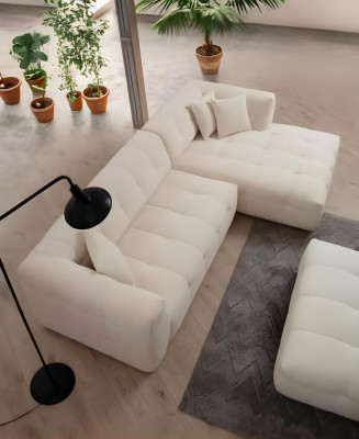 Elegant L-shaped corner sofa with modern 2-piece pouf