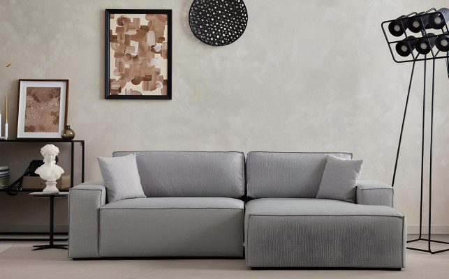 White fabric L-shaped corner sofa for the living room