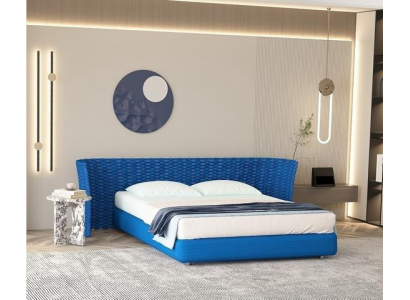 Blue fabric bed with upholstered headboard