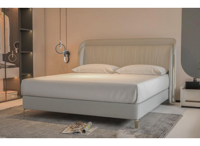Modern luxury bed with elegant gold headboard in gray color