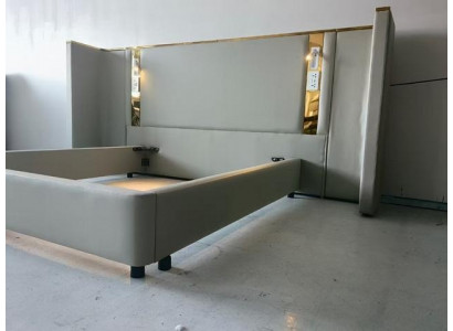 Luxury beige shaped bed with LED lighting, gold frame, and modern backrest