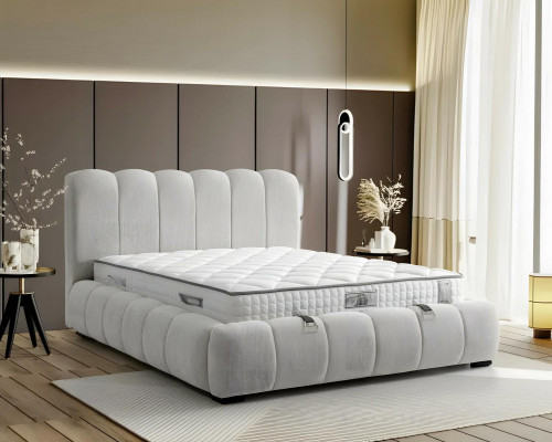 Bed made of modern white textile with quality mattress