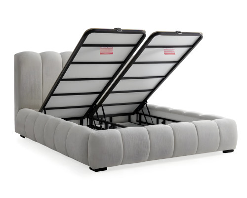 Bed made of modern white textile with quality mattress