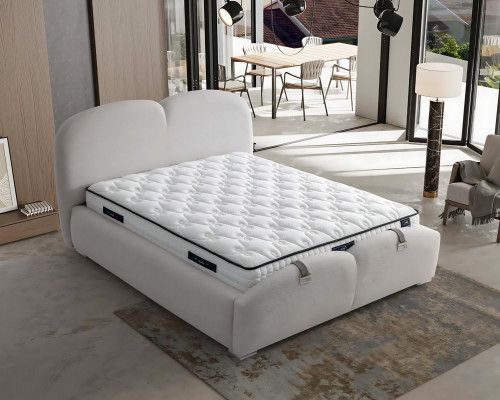 Modern white bed with upholstery and wooden mattress