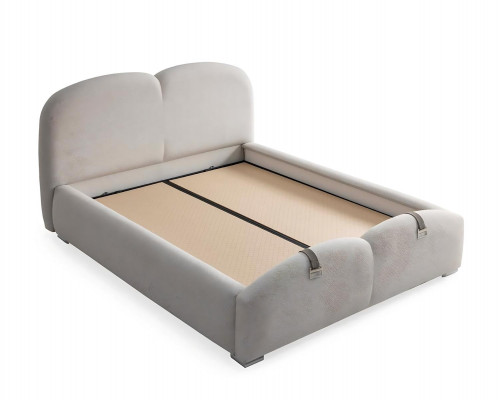 Modern white bed with upholstery and wooden mattress