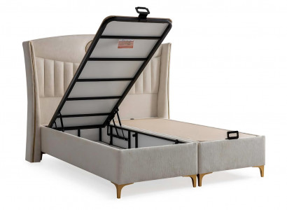 Elegant bed with cushions made of light gray fabric and wood