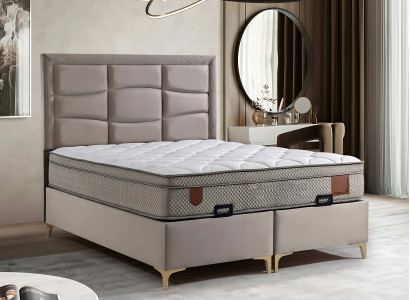 Beige bed with fabric and wood pillow