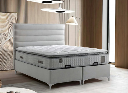Bed made of modern gray textile with elegant mattress