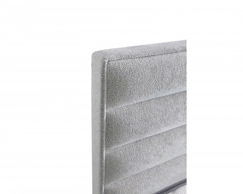 Bed made of modern gray textile with elegant mattress