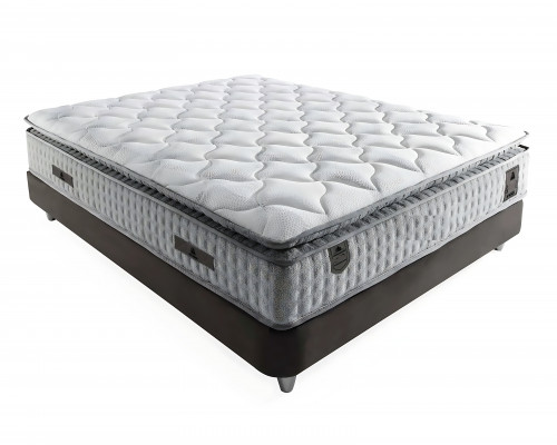 Bed made of modern gray textile with elegant mattress