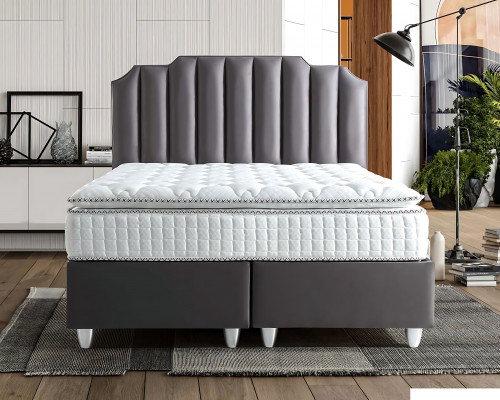 Elegant textile and wood bed with mattress