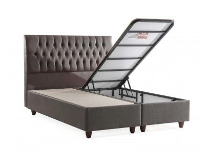 Bed with elegant design and mattress creates a pleasant atmosphere.