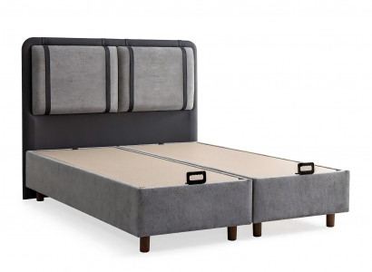 Elegant and stable bed with mattress that adds charm to the interior.