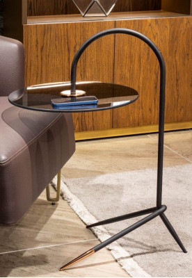 Designer side table with glass surface for a luxury look in the living room