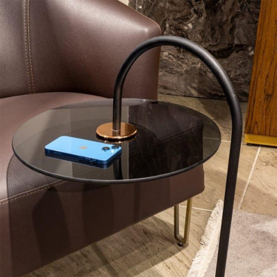 Designer side table with glass surface for a luxury look in the living room