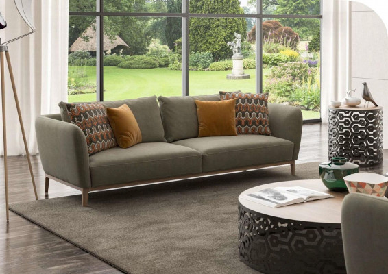Olive green three-seater modern living room couch seating furniture sofa.