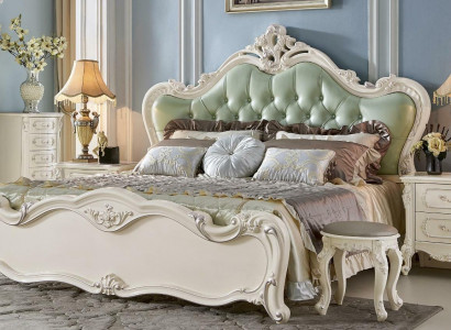 Classic bedroom set made of white wood and green leather in Baroque style