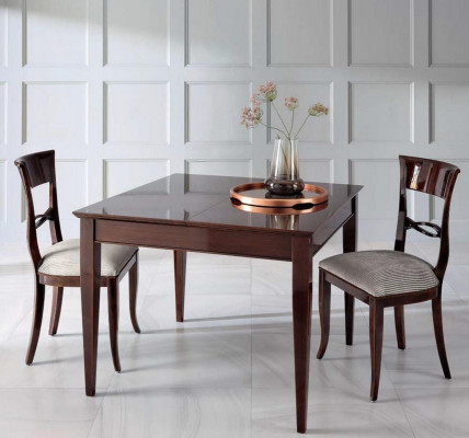 Elegant dining table with chairs in dark brown color with a glossy finish