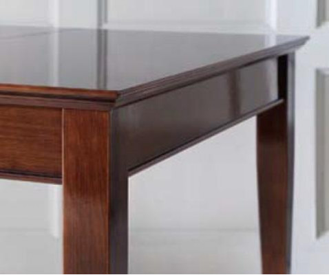 Elegant dining table with chairs in dark brown color with a glossy finish