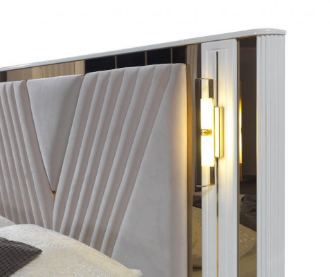 2-bedroom bed with gold embellishments and matching nightstands