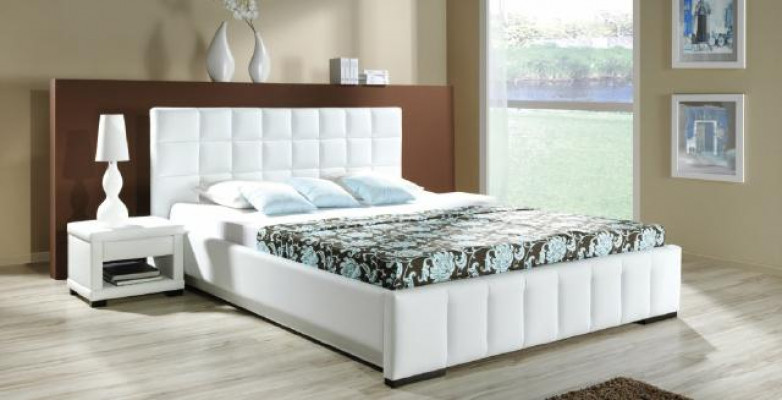 A luxurious designer bed in an elegant contemporary style of the highest quality