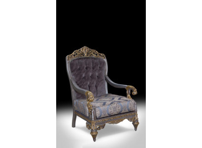 Elegant classic armchair with decorative patterns in Chesterfield design.