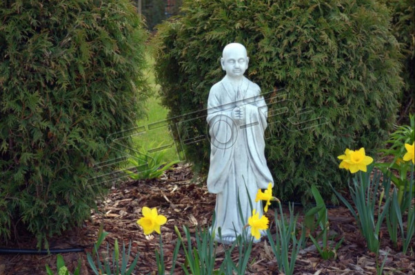 Buddha sculpture in stone look. Large decorative sculpture for garden figure.