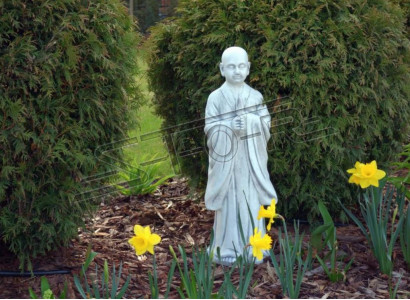 Buddha sculpture in stone look. Large decorative sculpture for garden figure.