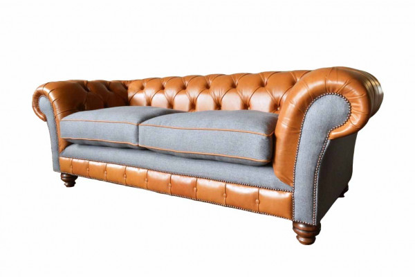 Luxurious faux leather sofa in Chesterfield 3-seater sofa design with three seats