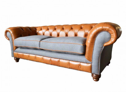 Luxurious faux leather sofa in Chesterfield 3-seater sofa design with three seats