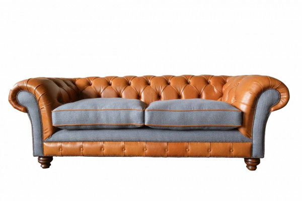 Luxurious faux leather sofa in Chesterfield 3-seater sofa design with three seats