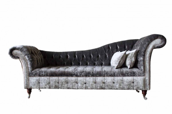 A luxurious, classic Chesterfield-style sofa in a rich silver tone.