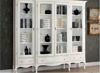 Classic white bookshelf with gilded accents