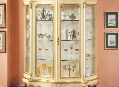 Glass display cabinet with artistic carvings and elegant design