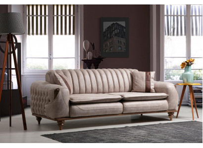 Beige three-seater Chesterfield couch, upholstered furniture, textile sofas, fabric.