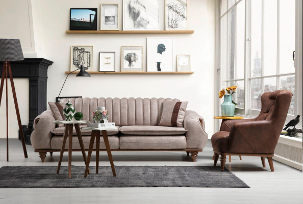 Beige three-seater Chesterfield couch, upholstered furniture, textile sofas, fabric.