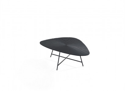 Stylish black coffee table for the living room with a carved tabletop